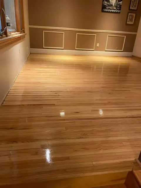 Professionally refinished hardwood floors throughout a Rochester NY home interior