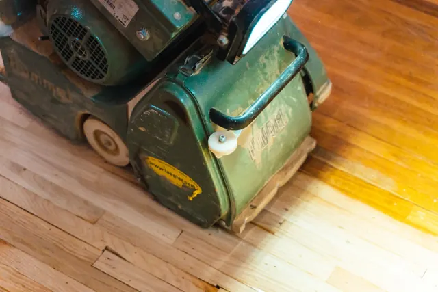 New hardwood floor installation with tight joints and professional finish