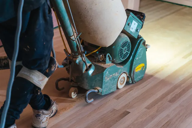 Hardwood floor refinishing results in a Rochester NY home with warm wood tones