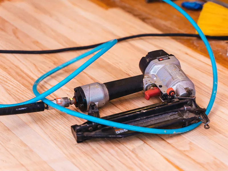 Nail gun used in hardwood floor installation